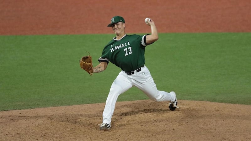 Jeremy Wu-Yelland pitches in a game for the University of Hawaii baseball team.