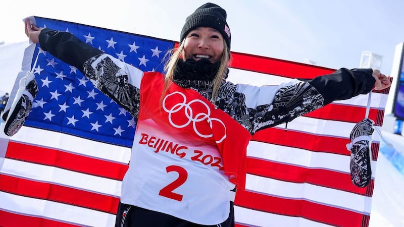 ZHANGJIAKOU, CHINA - FEBRUARY 10: Chloe Kim of Team United States celebrates winning the gold...