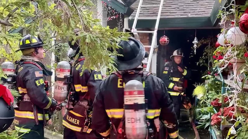 Two off-duty firefighters helped rescue a woman trapped in a house fire in California.