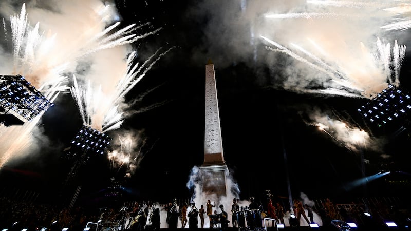 Artists perform with fireworks during the Paris 2024 Paralympic Opening Ceremony at the Place...