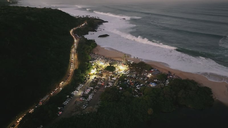 An aerial view of Waimea Bay as tens of thousands gather on Oahu's North Shore for the 2024...